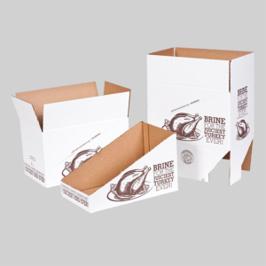 Three white cardboard boxes are displayed against a gray background. Each box features detailed graphics and text reading "BRINE FOR THE JUICIEST TURKEY EVER," showcasing a roasted turkey. The package design is presented in various stages of assembly, from flat to fully constructed.