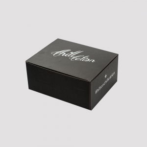 A black cardboard package adorned with stylish white cursive text on the lid that reads "Chiliton." The side of the packaging also features a hashtag "#introchiliton" in the same white font. Sharp graphics make this closed box stand out against a plain white background.