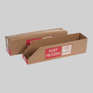 Two brown cardboard boxes with red labels that say "KEEP FROZEN" on the sides and "Sandwich" on the end sit against a plain, light gray background. One shipping container is opened with a slanted end, while the other remains closed.