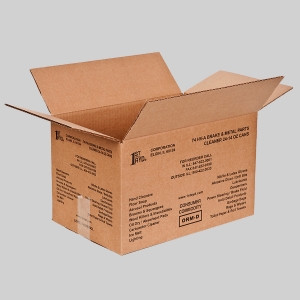 A brown corrugated cardboard shipping container with flaps open. The box features printed text with branding and sharp graphics, including "1st Ayd Corporation" and a list of items offered, such as hand cleaners, floor squeegees, and gloves.