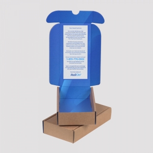 An opened cardboard box with a blue interior, featuring sharp graphics, contains a thank you note on the lid. The note is from ReliOn, providing a customer service number 1-855-776-0662. The package design includes foldable flaps, and part of the packaging is not visible in the image.