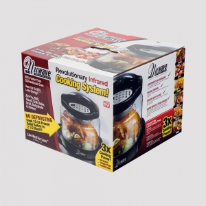 A product box for the "NuWave Oven Pro Plus" is displayed with sharp graphics. The packaging highlights key features such as "Revolutionary Infrared Cooking System," "50% Faster Than Conventional Ovens," "No Defrosting Needed," and "3x Cooking Power." The box includes images of cooked food.