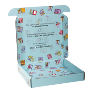 Open light blue cardboard box showcasing sharp graphics and colorful book illustrations on the inner surfaces. Instructions for sharing on social media, referring friends, and leaving reviews are printed inside, along with relevant URLs and a tag "@justlikemebox.